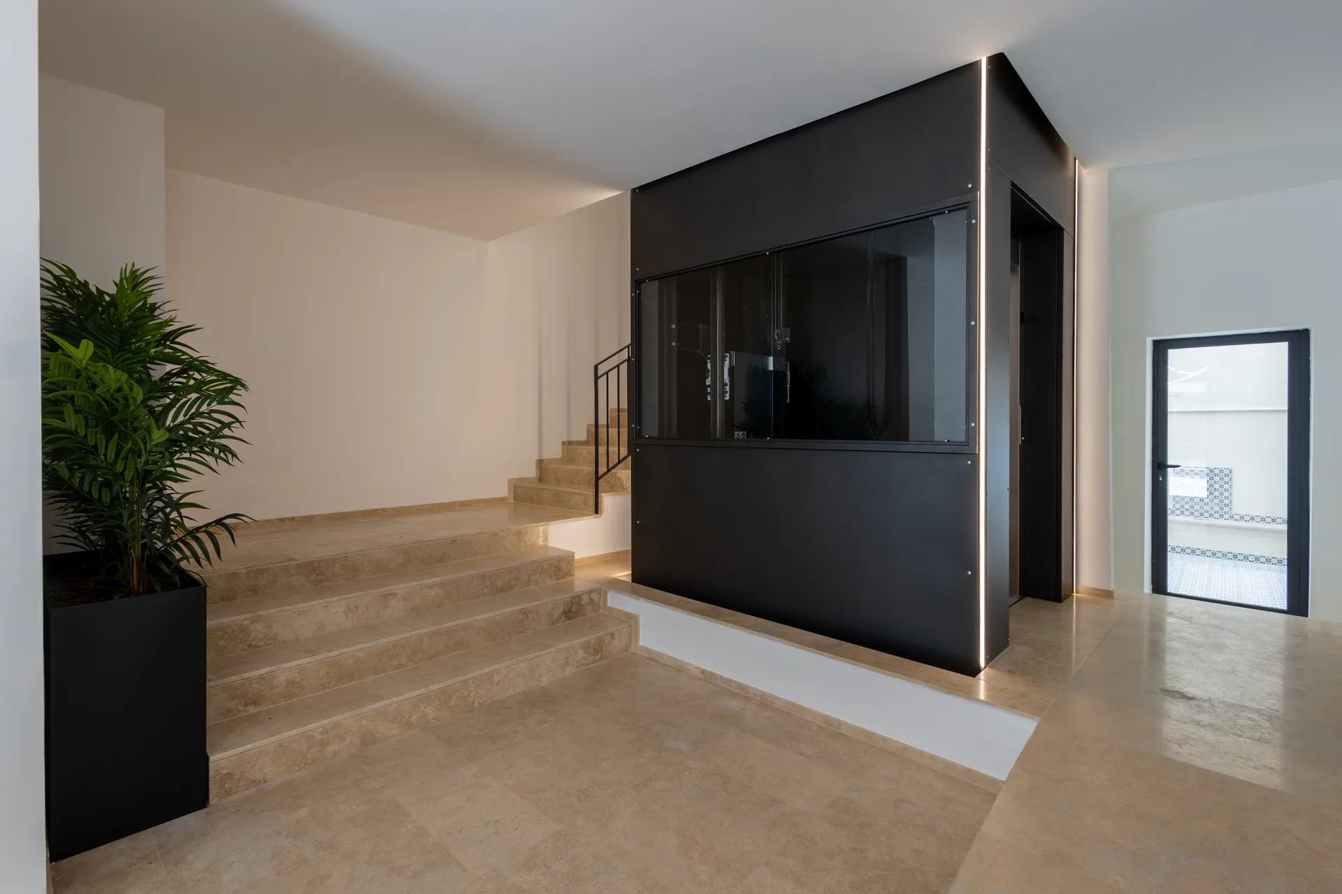 The staircase and the modern lift